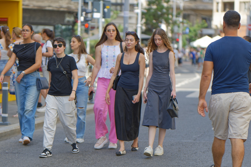 A lively street scene in Bucharest, where pedestrian-only zones are frequently implemented for weekend events like Strazi Deschise